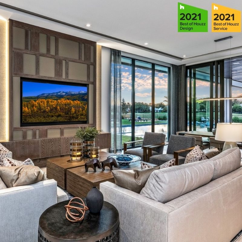 A living room with couches and tables in it